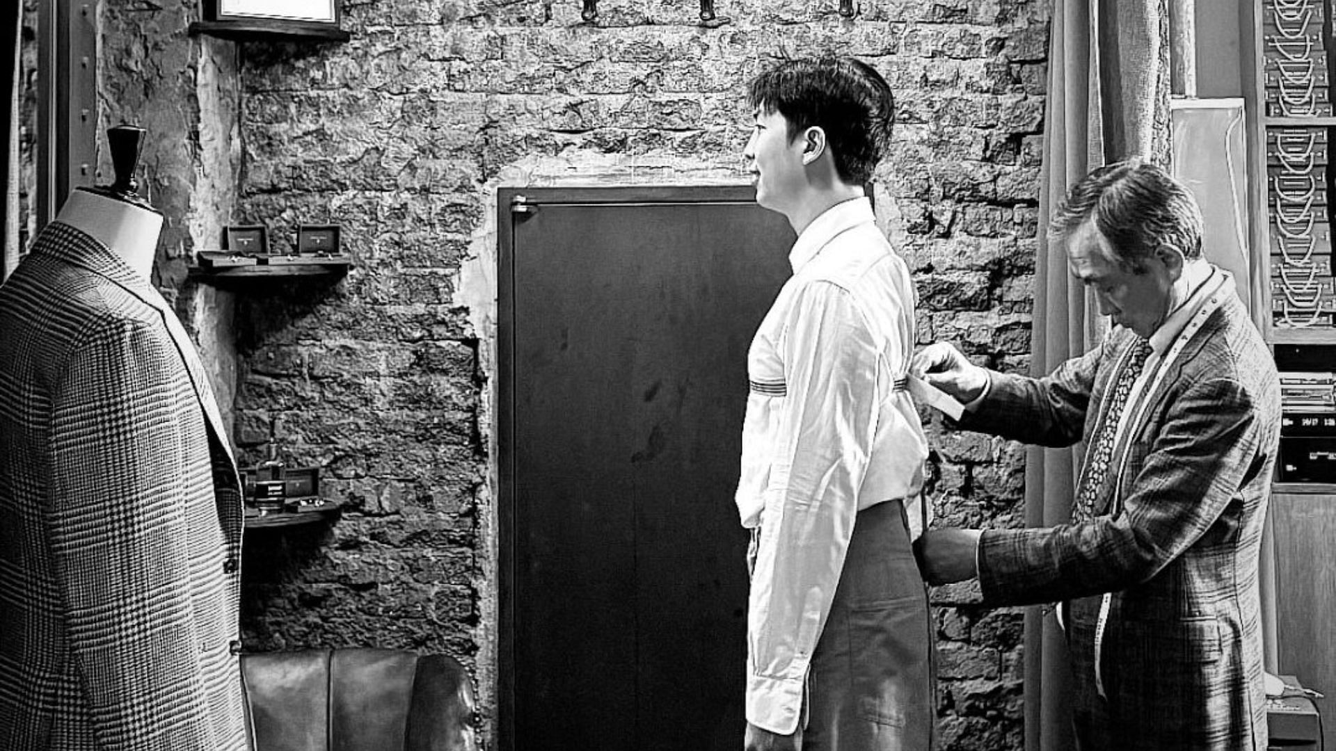 BTS' RM trying a tailored suit (Image Via Instagram/@kimvenchy)